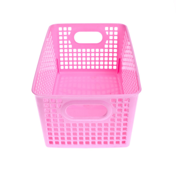 白い背景上に分離されてピンクのプラスチック バスケット - 写真・画像