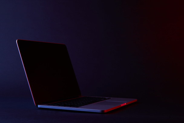 one turned off laptop on dark surface - Photo, Image