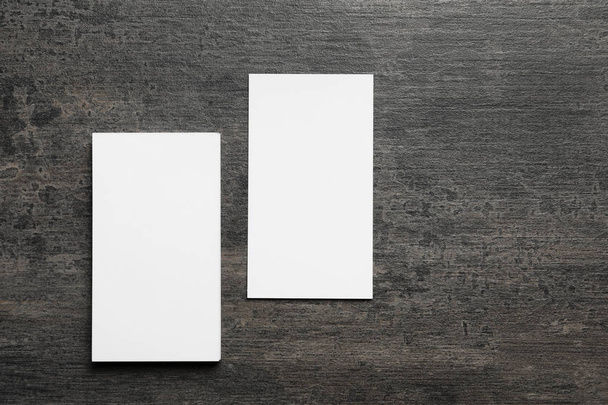 Blank business cards on grey background - Foto, imagen