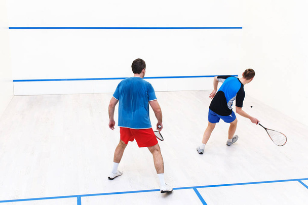 squash players back view - Fotoğraf, Görsel