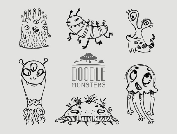 Hand drawn doodle monsters on grey background - Foto, afbeelding