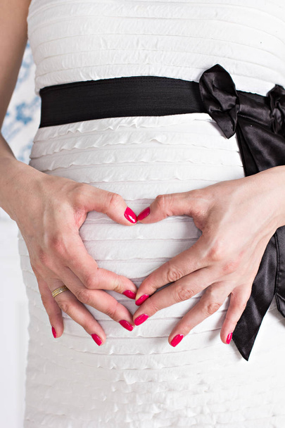 Pregnant girl. Pregnant belly closeup.  - Photo, Image