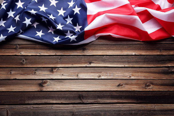 American flag on brown wooden table - Foto, Imagem