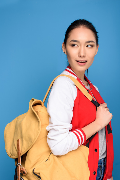 portrait of beautiful asian student with backpack isolated on blue - Fotoğraf, Görsel