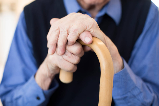 Close Up Of Senior Man Holding Walking Cane - Photo, Image