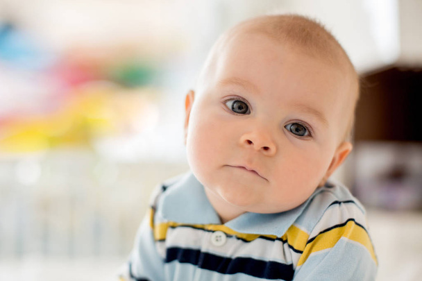 Portrait of a cute  infant baby boy. Happy childhood concept. - Photo, image