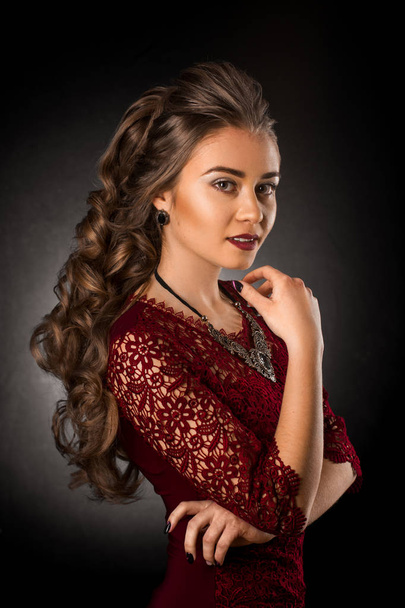 Charming young girl with beautiful curly hairstyle  - Fotografie, Obrázek