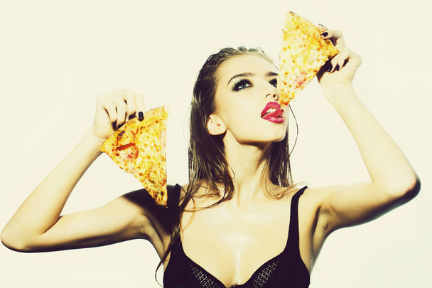 Young girl with pizza - Fotó, kép