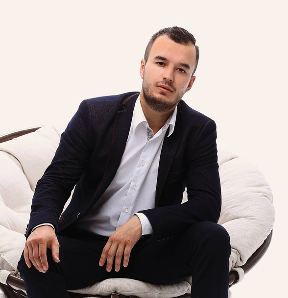 young businessman sitting in a comfortable chair - Foto, imagen