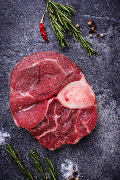 Raw meat osso buco with spices  - Photo, Image