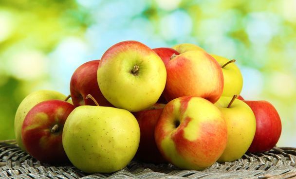 juicy apples, on green background - Fotó, kép