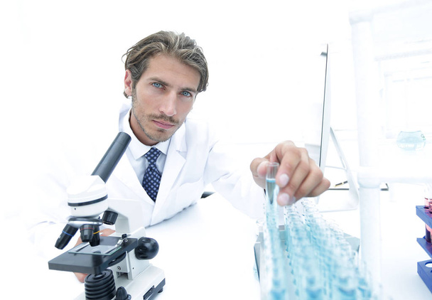 laboratory scientist working in a laboratory with a microscope - Zdjęcie, obraz