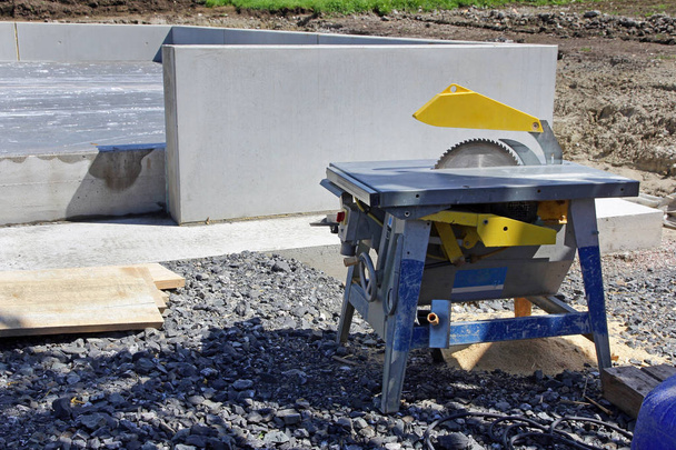 Circular table saw with saw blade at a construction site - Photo, Image