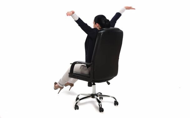 Happy Beautiful business woman stretching on leader office chair. isolated on white background - Foto, Imagen