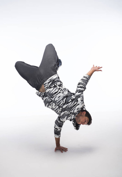 Cool young break dancer isolated on white background - Photo, Image