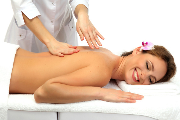 beautiful woman in spa salon getting massage, isolated on white - Фото, зображення