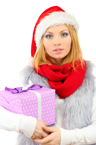 Attractive young woman holding Christmas gift, isolated on white - Фото, зображення