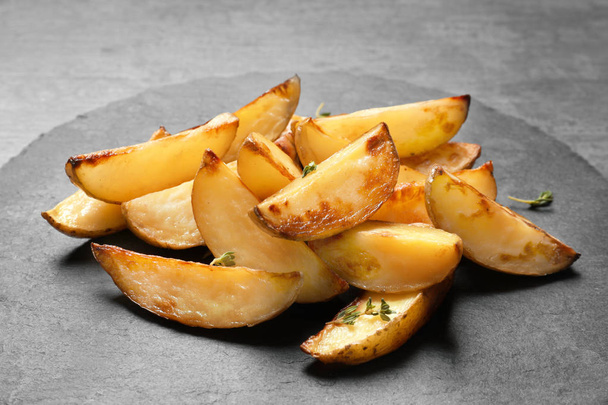 delicious baked potato wedges  - Fotoğraf, Görsel