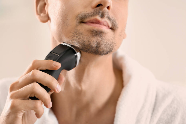 young man shaving - Photo, Image