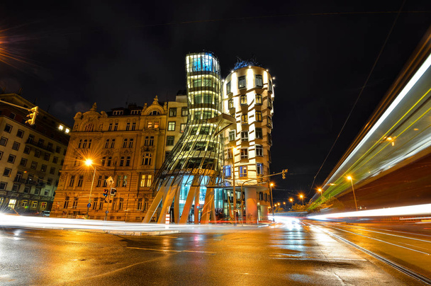 Prague, Czech Republic - October 11, 2017: Night view on moder building Dancing House or Fred and Ginger.  Nationale-Nederlanden building on the  (Ran Embankment) in Prague, Czech Republic - Φωτογραφία, εικόνα