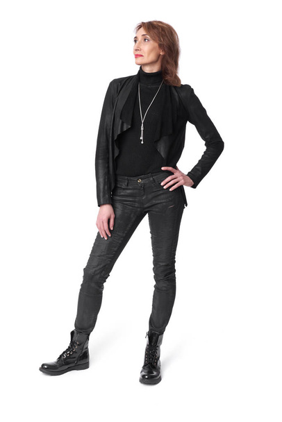 full length of middle aged woman in leather clothes - Foto, Imagem