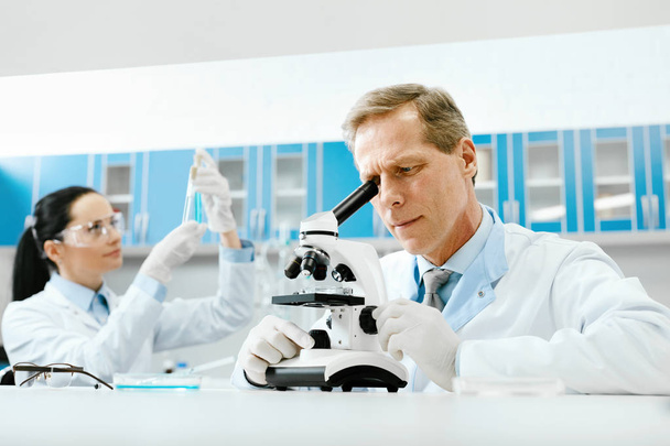 Scientists In Laboratory. Medical Workers At Work - Φωτογραφία, εικόνα