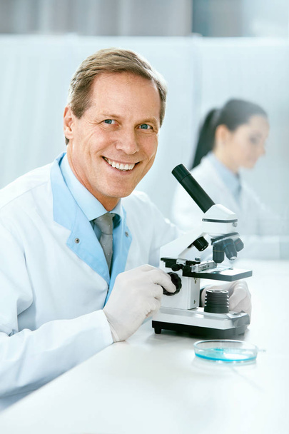 Scientists In Laboratory. Medical Workers At Work - Fotografie, Obrázek