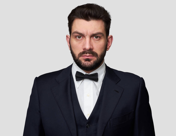 Confident handsome bearded man in classic suit  - Fotó, kép
