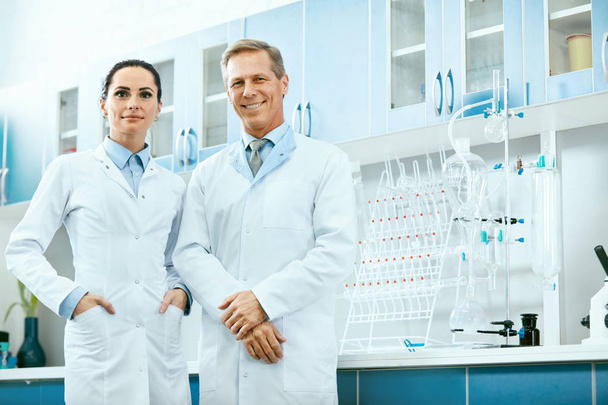 Scientists In Laboratory. Medical Workers At Work - Zdjęcie, obraz