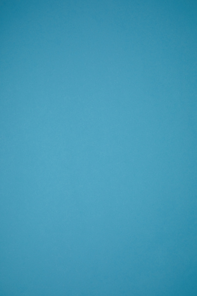 lichte abstracte achtergrond gemaakt van blauw gekleurd papier - Foto, afbeelding
