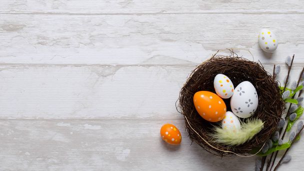 Happy easter decoration background, eggs in the nest - Photo, Image