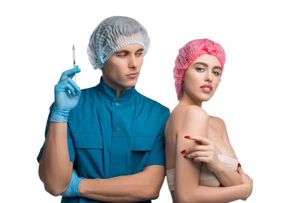 Plastic surgeon with his beautiful patient shot - Photo, image