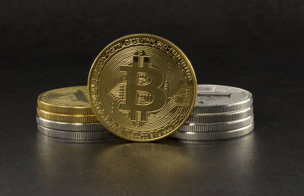 bitcoin and litecoin on black background - Photo, image