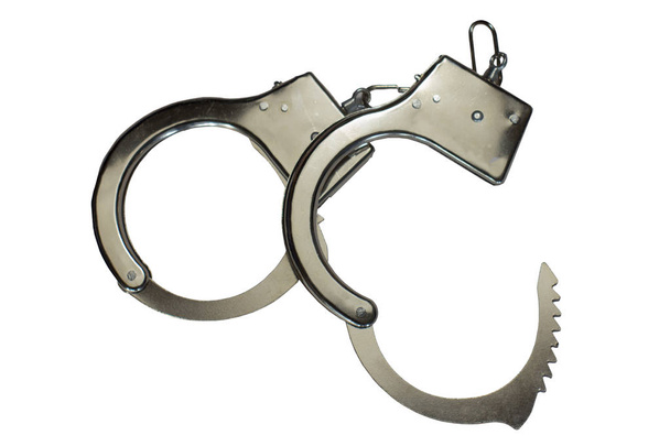 Handcuffs on white background. Isolate - Photo, Image