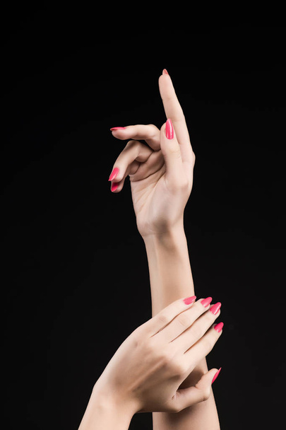 beautiful woman hands with pink manicure on the nails isolated o - Foto, Imagem