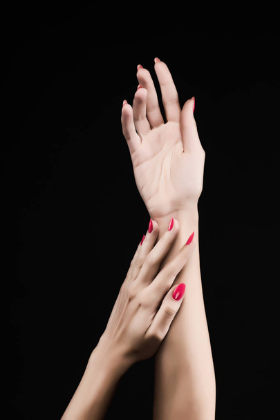 beautiful woman hands with pink manicure on the nails isolated o - Foto, Imagen