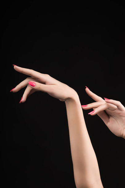 beautiful woman hands with pink manicure on the nails isolated o - Photo, Image