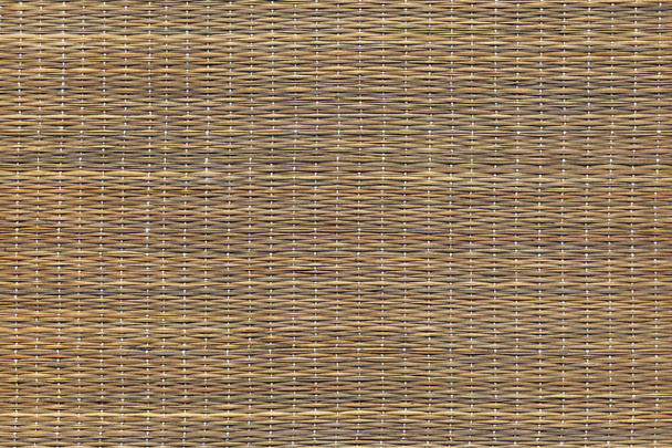 Natuurlijke bruin gevlochten geïnterlinieerd stro plaats Mat rustieke grof G - Foto, afbeelding