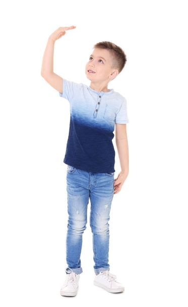 Little boy measuring height on white background - Foto, afbeelding