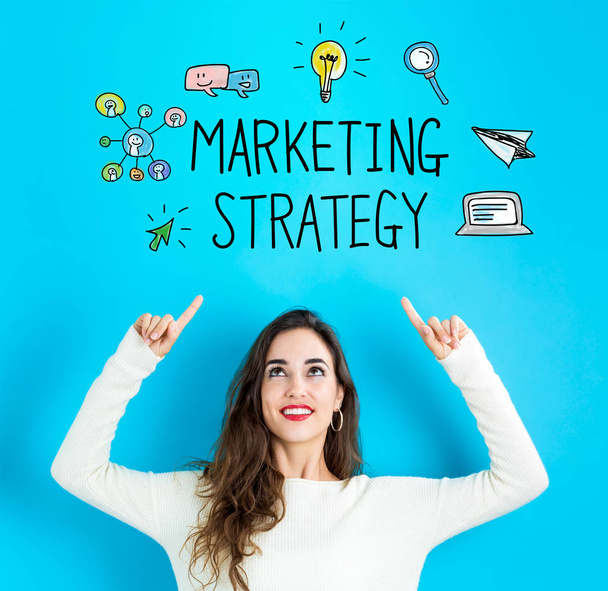 Marketing Strategy with young woman looking upwards - Φωτογραφία, εικόνα