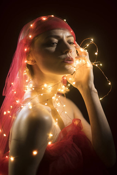 Girl with string with led lights around her body - Zdjęcie, obraz