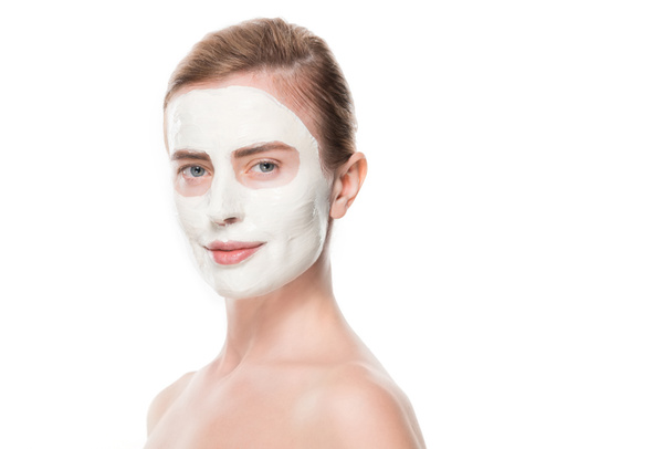 Portrait of woman with facial skincare mask isolated on white - Foto, Imagem