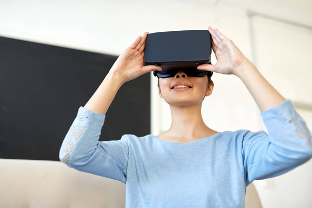 happy woman with virtual reality headset at office - 写真・画像
