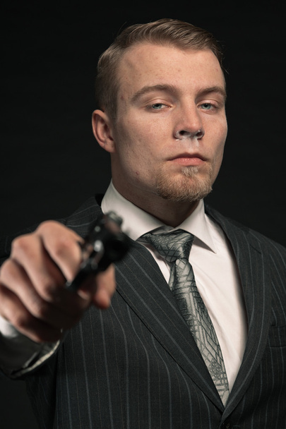 Mafia man with gun. - Foto, afbeelding
