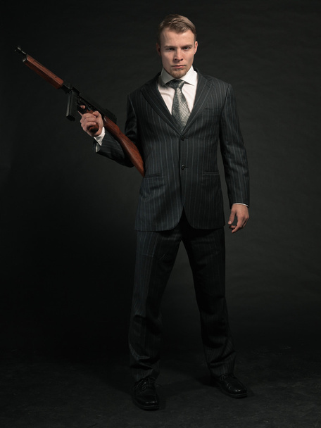Mafia man with gun. - Foto, afbeelding