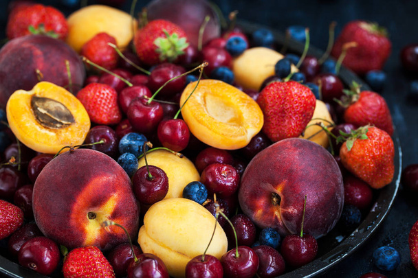 Fresh ripe summer berries and fruits  - Photo, Image