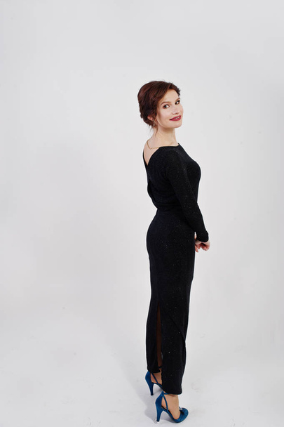 Elegance woman in black evening dress posed on studio isolated o - Foto, imagen