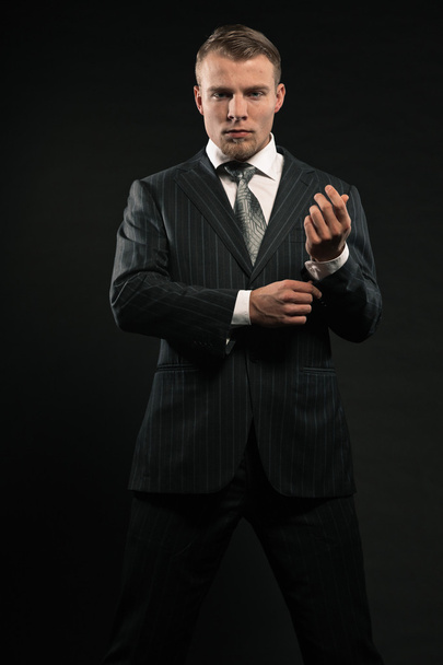 Fashion man wearing suit. - Фото, изображение