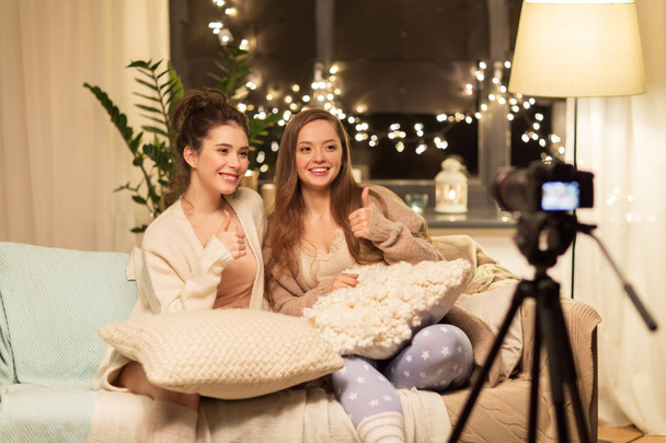 female bloggers with camera recording home video - Foto, Bild