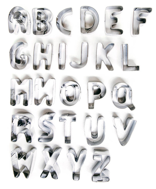 cookie cutter betűk elszigetelt fehér background. - Fotó, kép